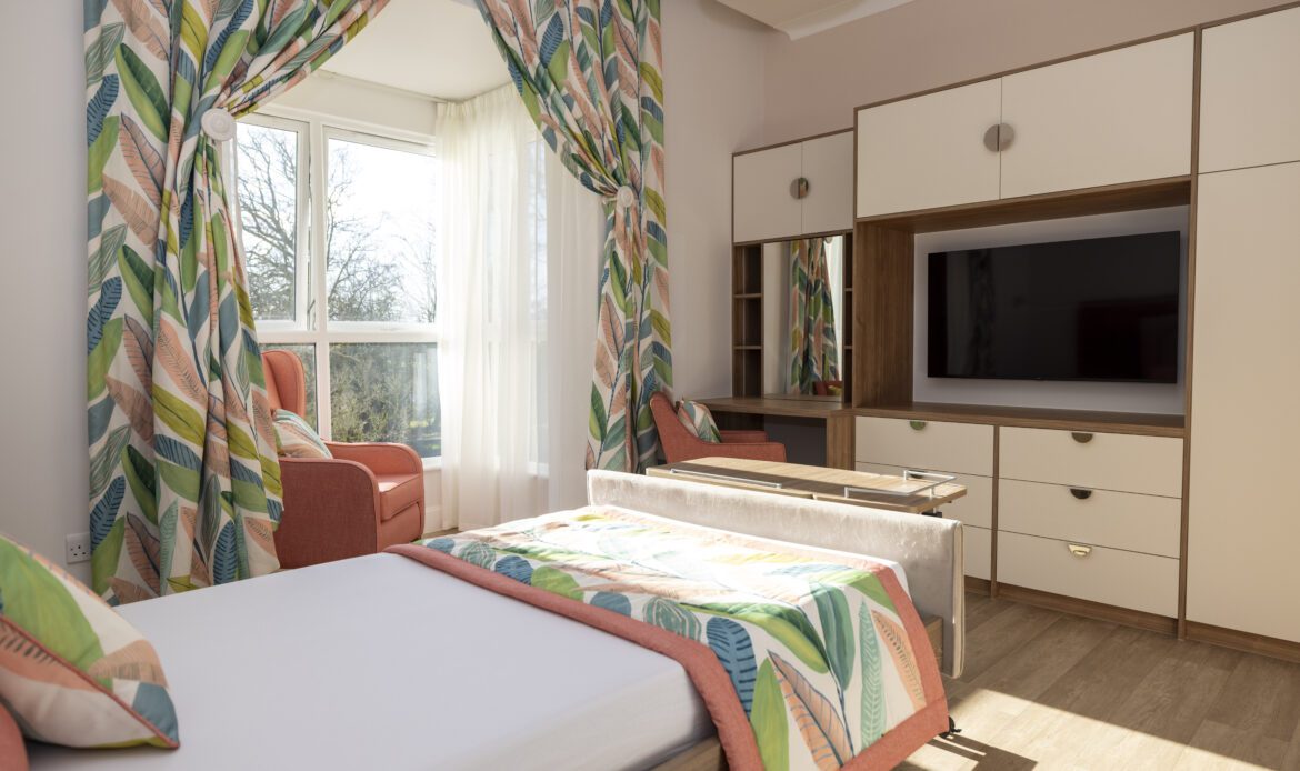 Brightly lit Cedar Care Homes bedroom with en-suite and comfortable furnishings